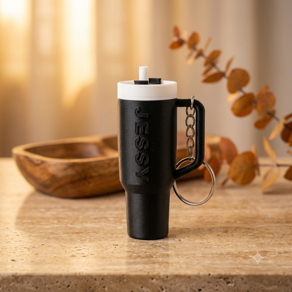 Sipper shared keychain in black colour with name Jessy