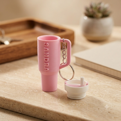 Sipper shaped keychain in pink colour with name Sandra