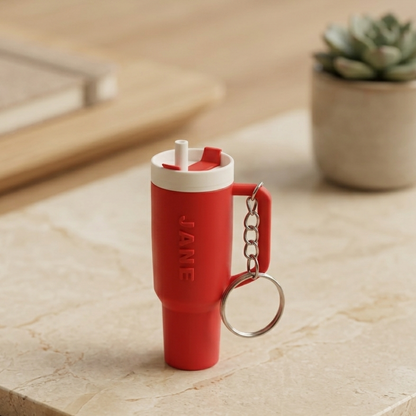 Sipper shaped keychain in red colour with name Jane